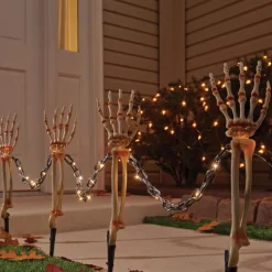 Celebrations Halloween Warm White 18 in. LED Prelit Chained Skeleton Arms Pathway Decor