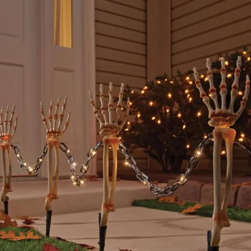 Celebrations Halloween Warm White 18 in. LED Prelit Chained Skeleton Arms Pathway Decor